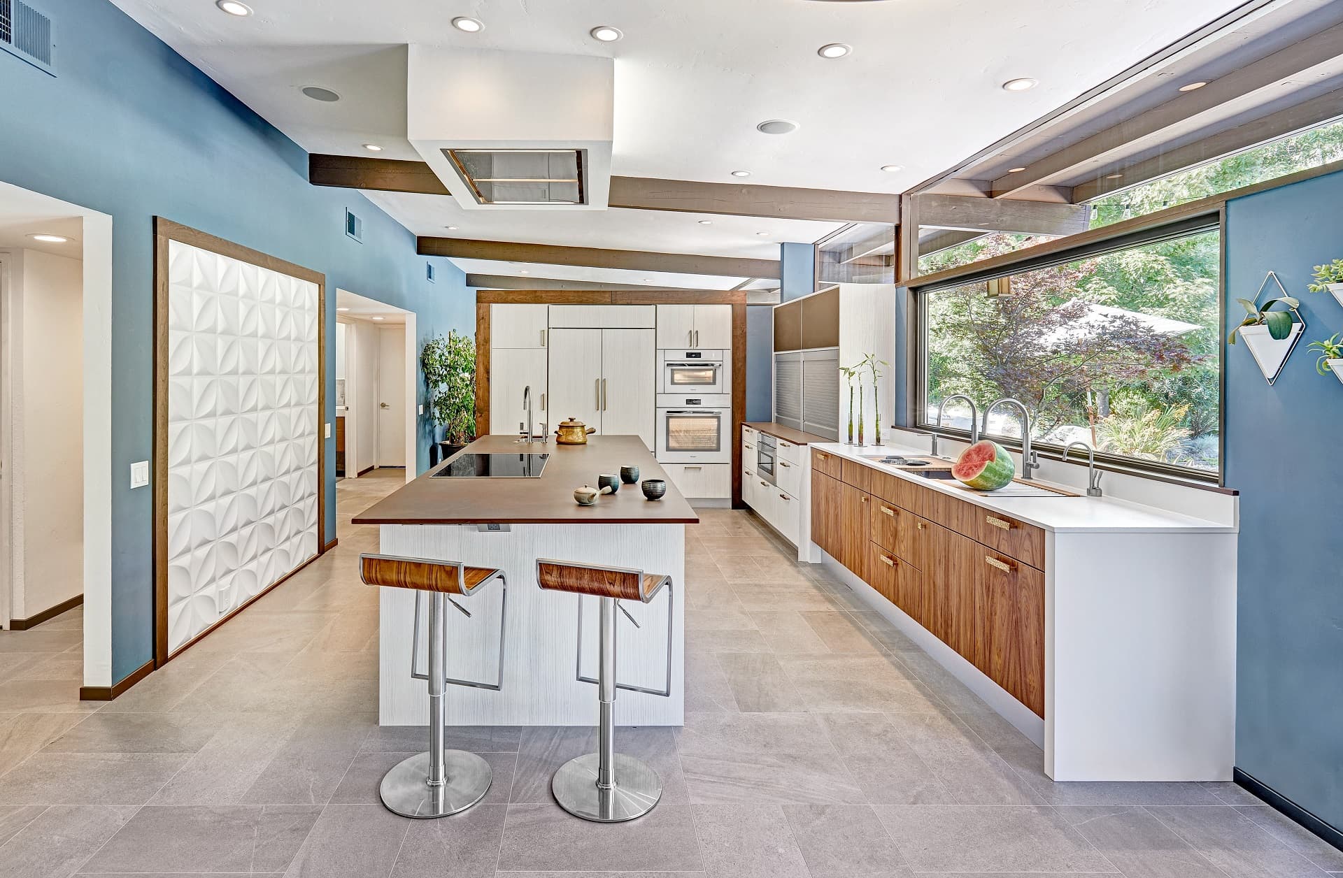 Light Contemporary Kitchen With Walnut Accent