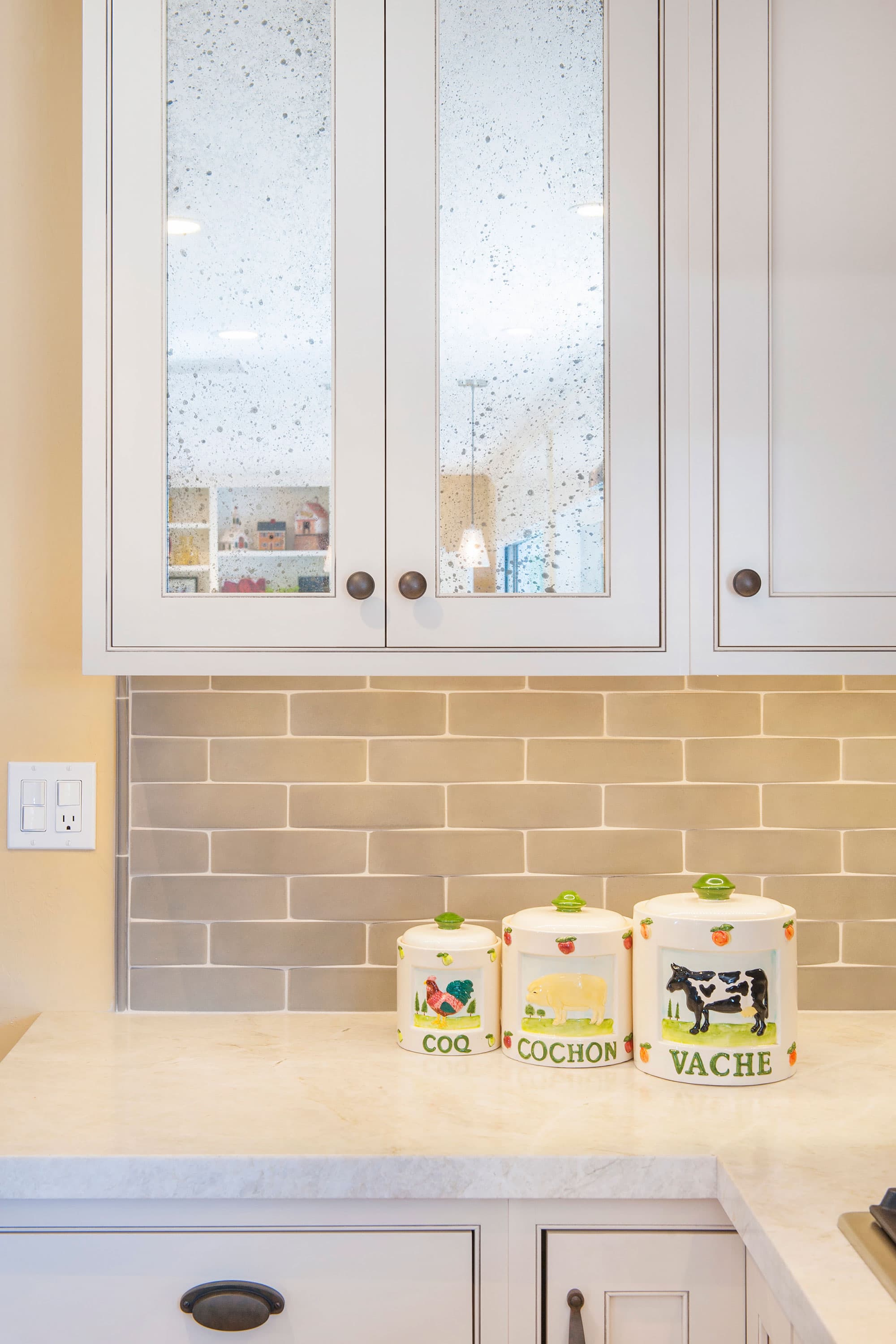 Transitional Painted White Kitchen With Grey Stained Peninsula